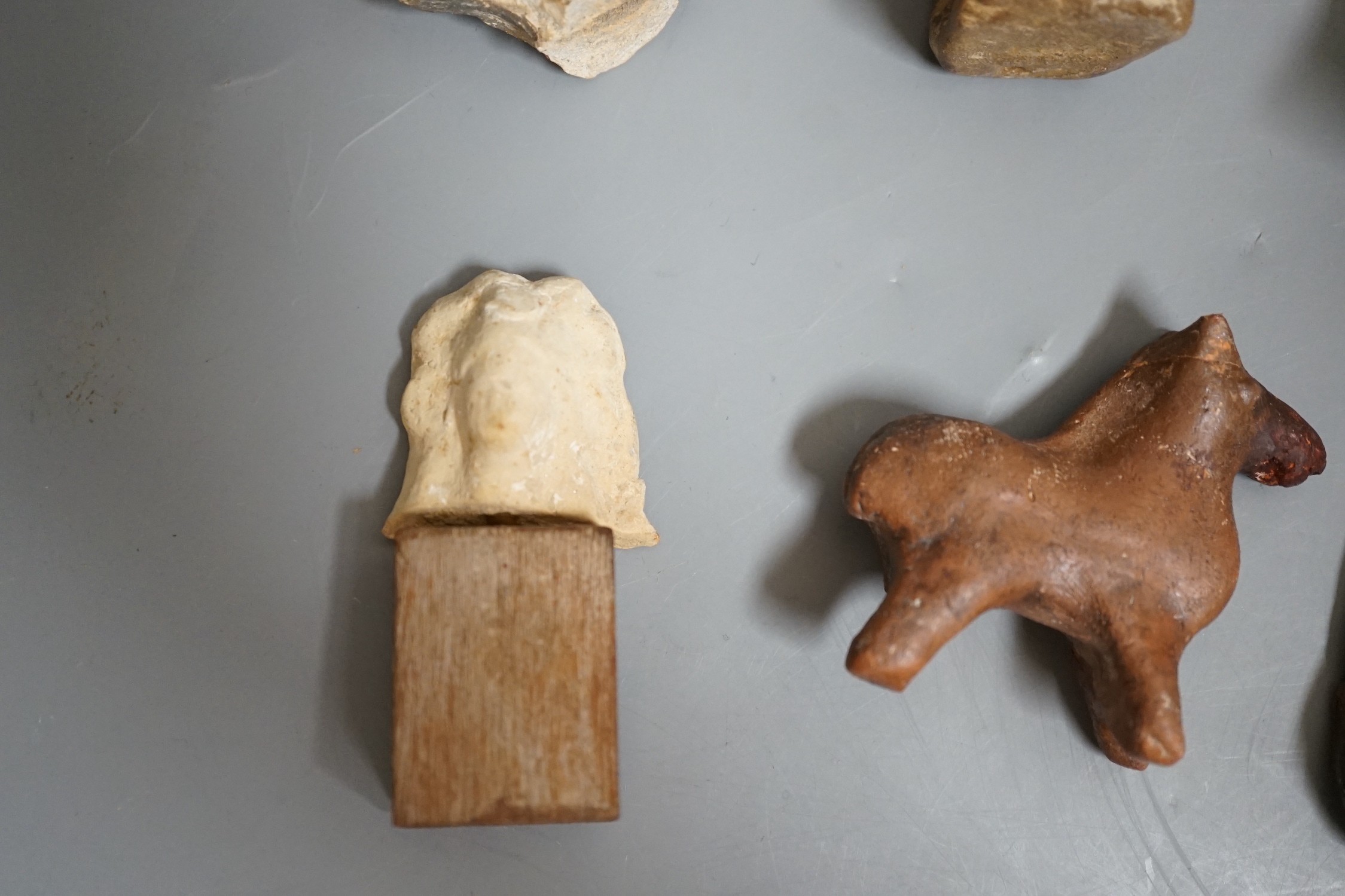 Assortment of pottery antiquities and fragments